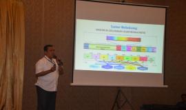 Kasubdit Pelayanan Spektrum Non-Dinas Tetap dan Bergerak Darat (NDTBD), Gunadi menyampaikan Pelayanan Perizinan Spektrum Frekuensi Radio kepada Peserta Workshop. (23/3