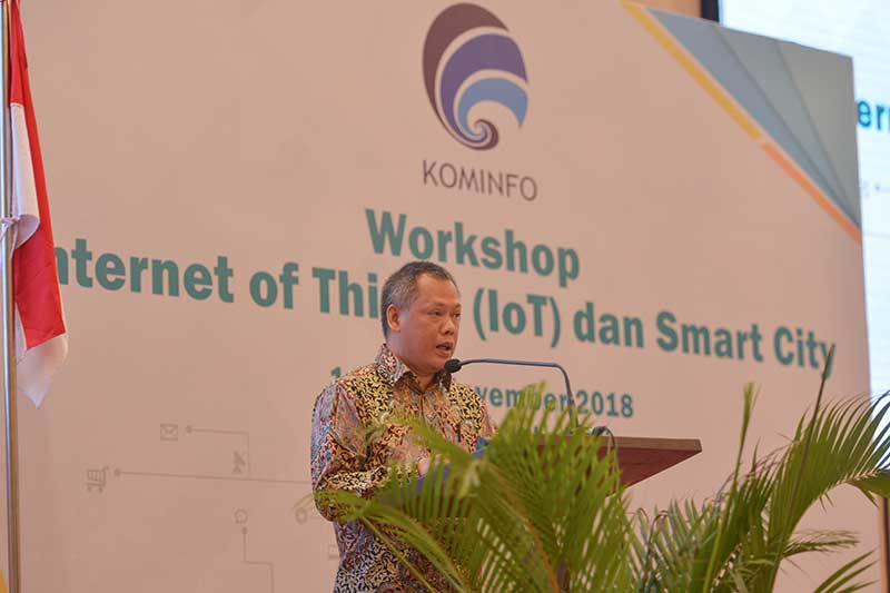 Direktur Standardisasi Perangkat Pos dan Informatika (PPI), Ditjen SDPPI, Kemkominfo, Mochamad Hadiyana, memberikan sambutan ketika membuka Workshop IoT dan Smart City di Bali, Rabu (14/11/2018).